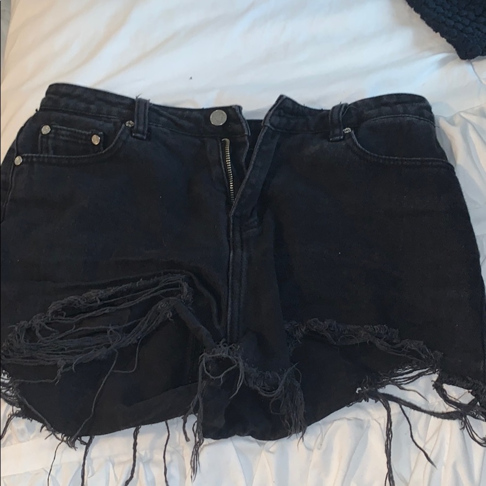Misguided black ripped hem high waist denim shorts